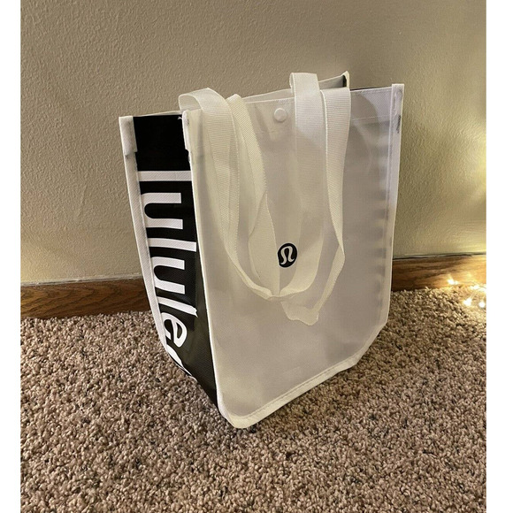 lululemon athletica Handbags - SOLD***Lululemon- Small Reusable Tote Bag Snap Button Close White 9" x 12"